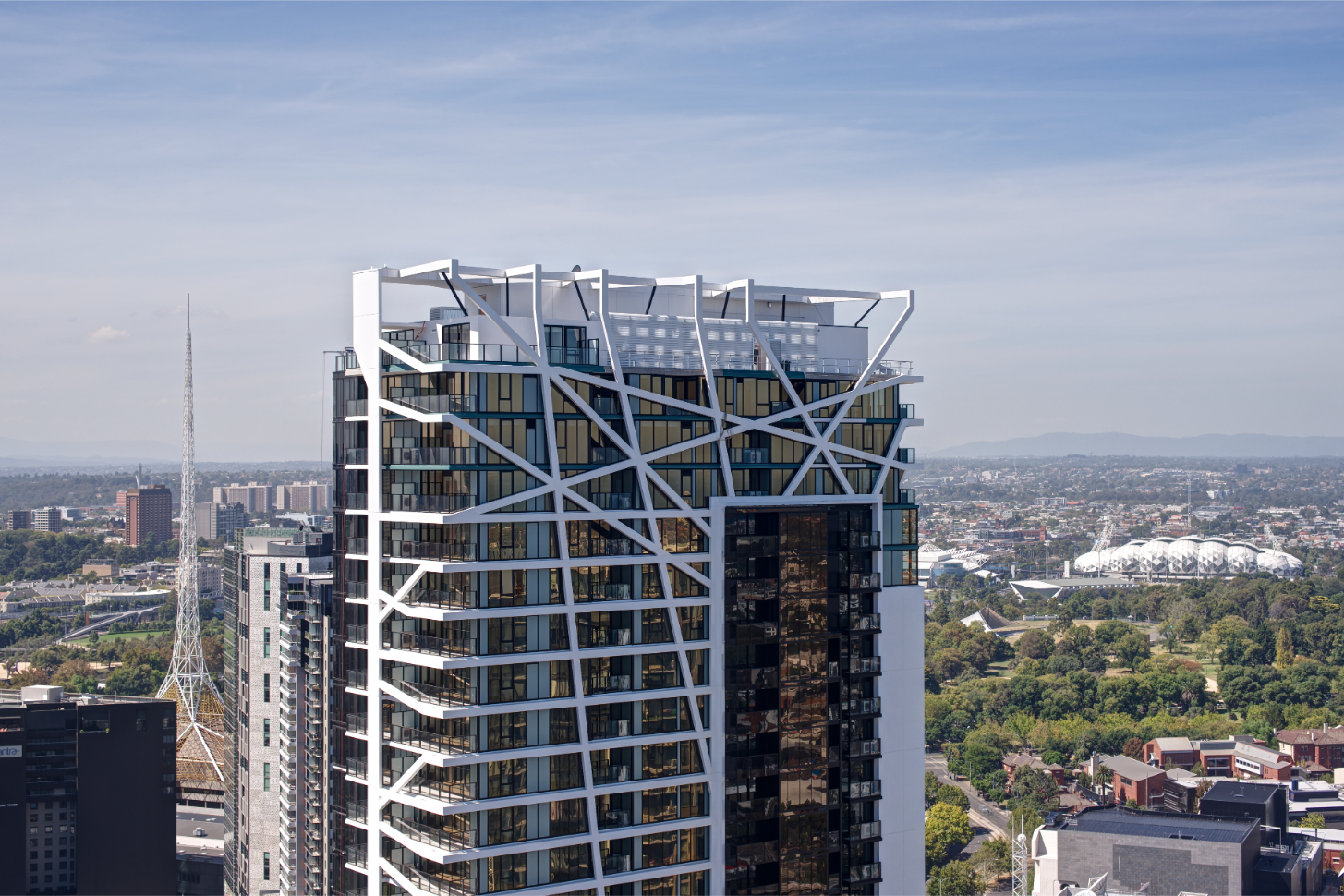 Modern high-rise with white lattice exterior